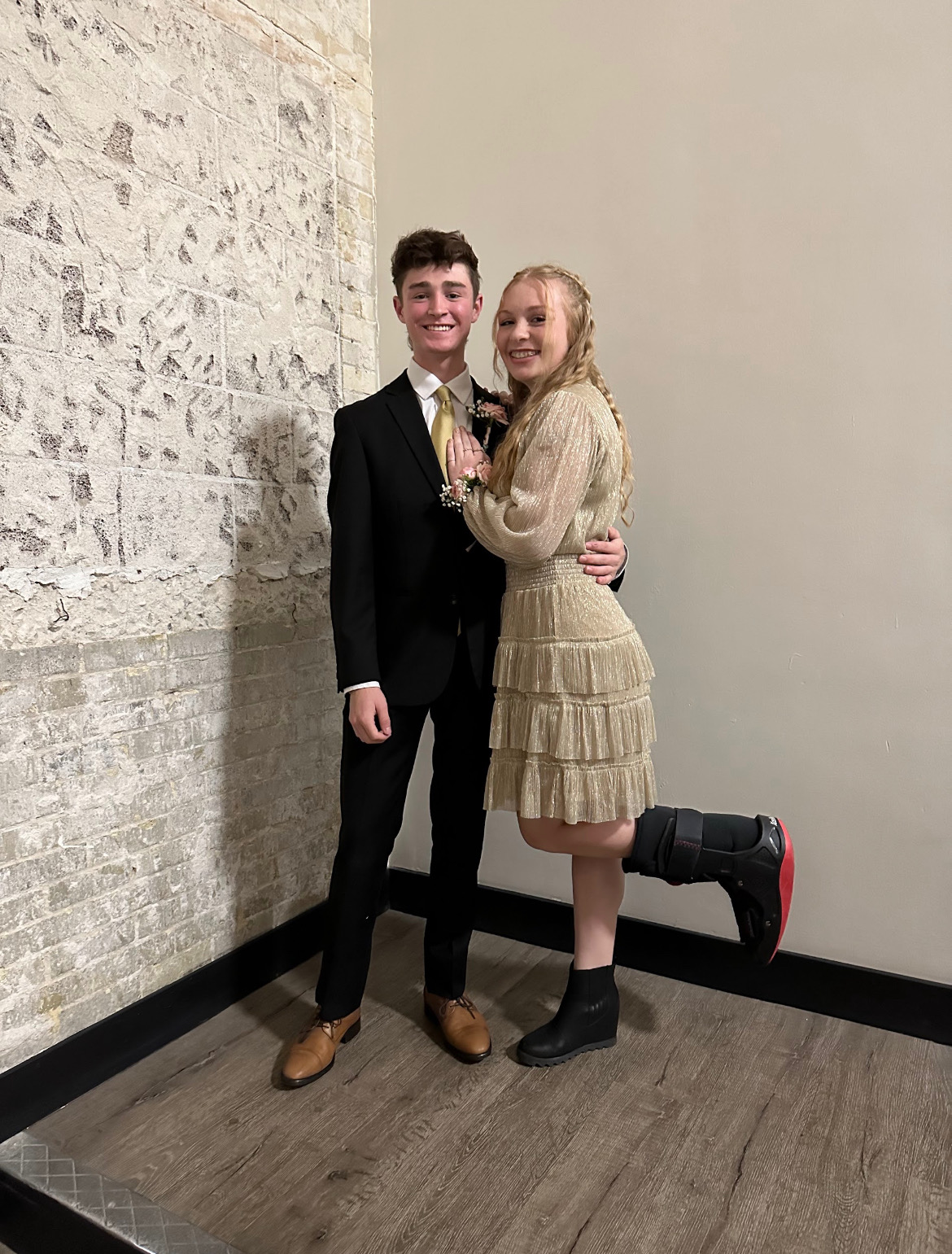 Dressed up for a dance with a broken foot